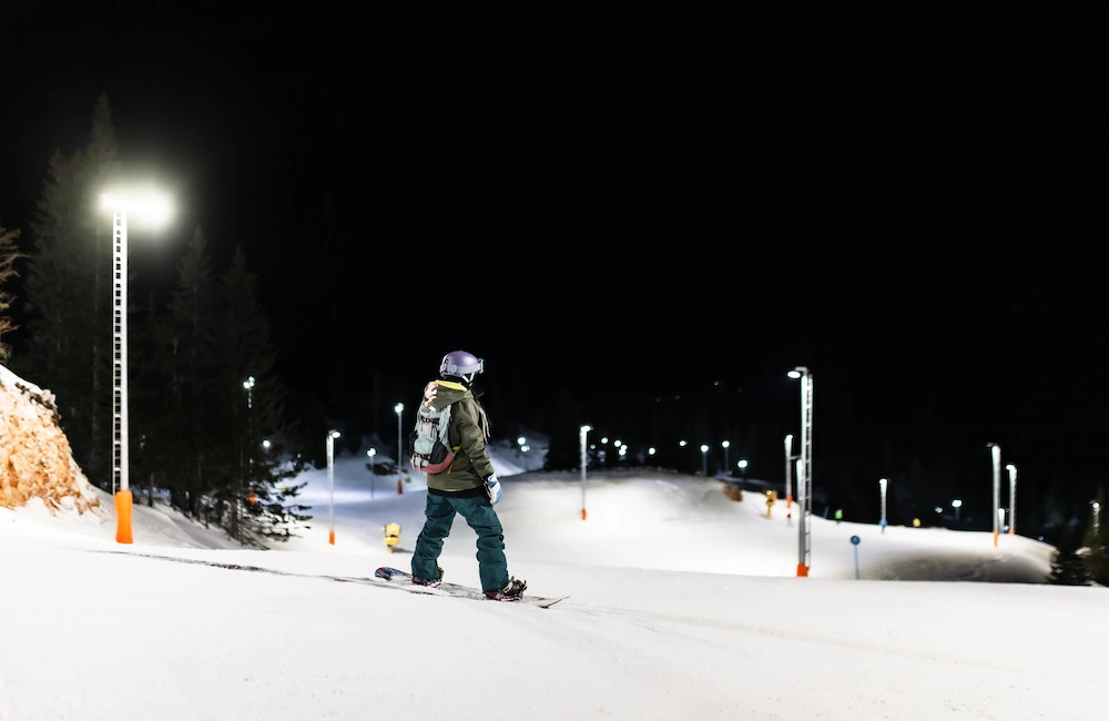 Snowboarder at night time