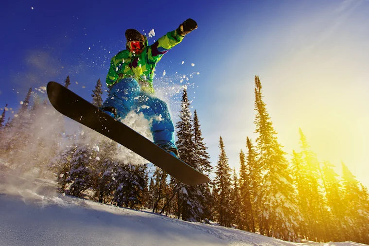 Snowboarder in the sun